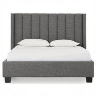Dark stone wingback bed