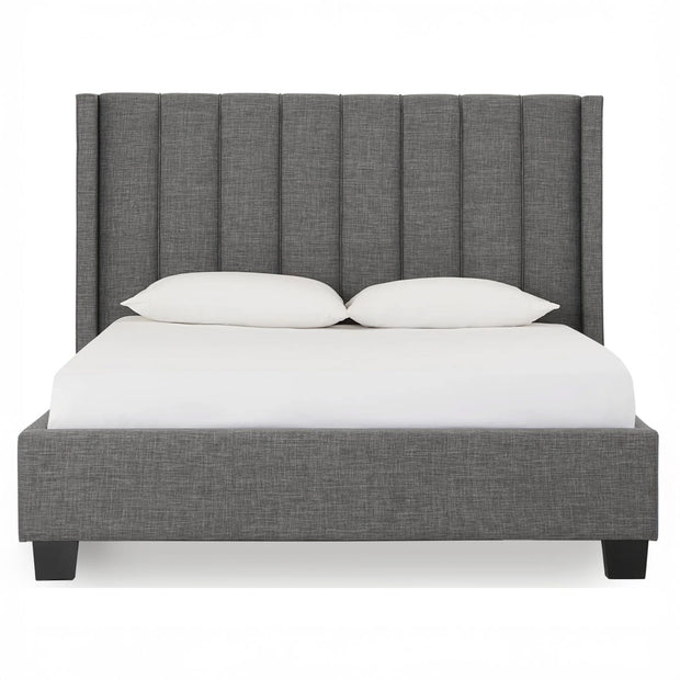 Dark stone wingback bed