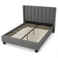 Dark stone wingback bed