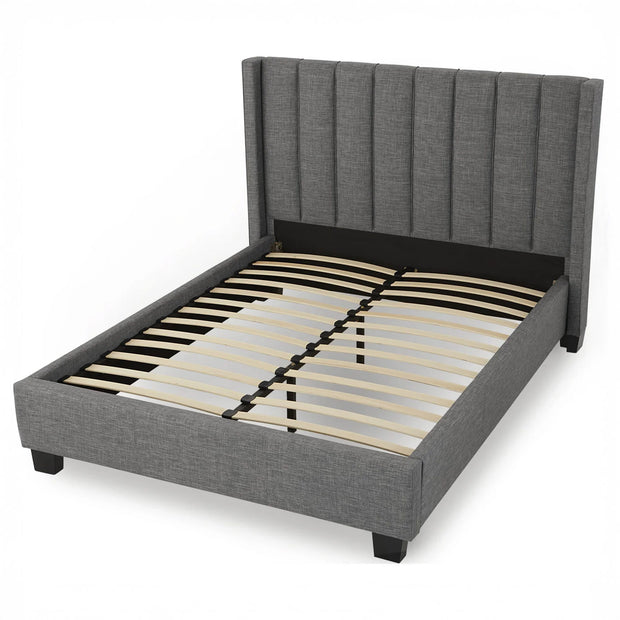 Dark stone wingback bed