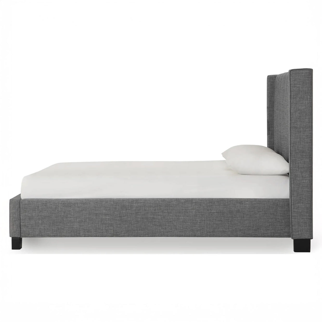 Dark stone wingback bed