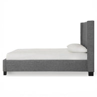 Dark stone wingback bed