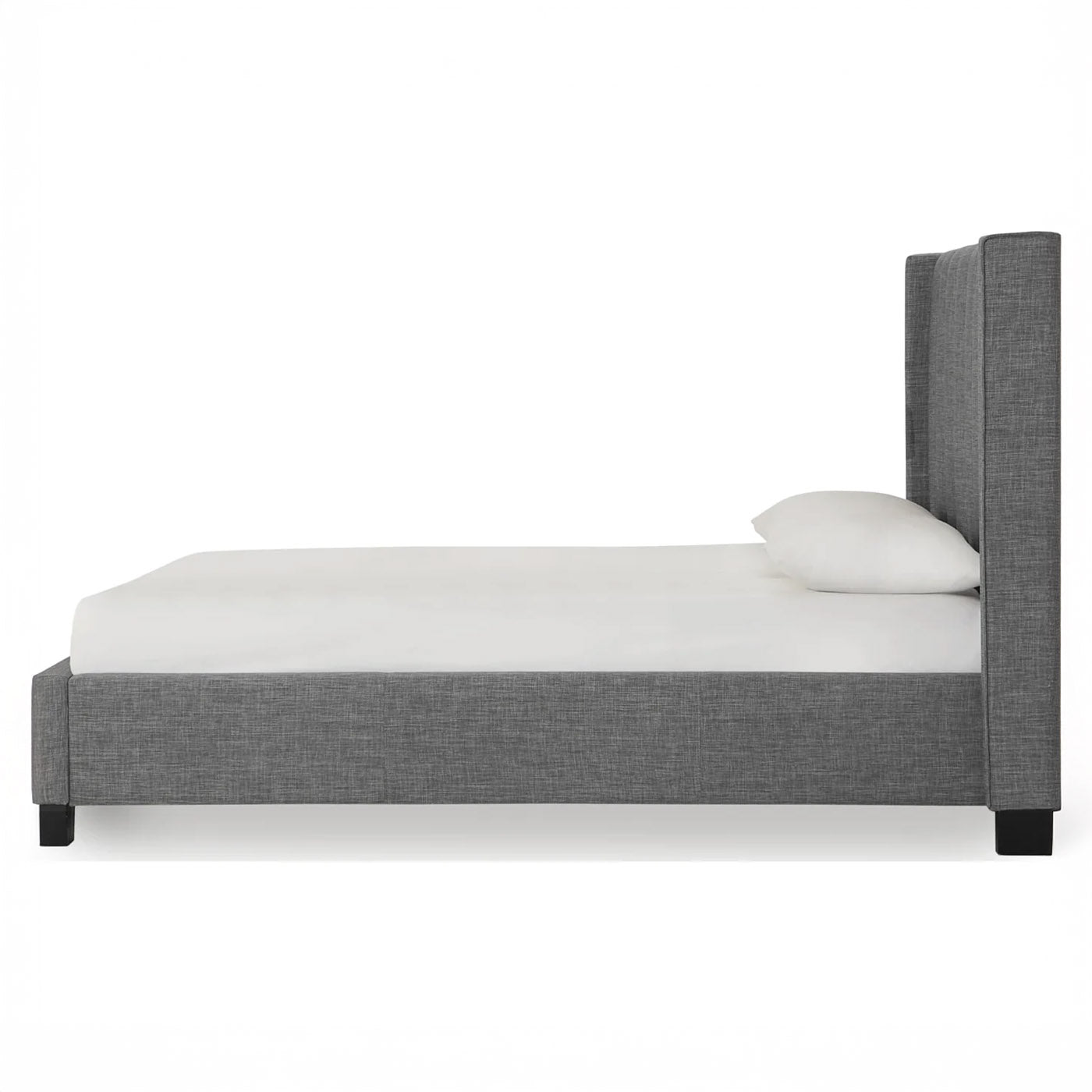 Dark stone wingback bed