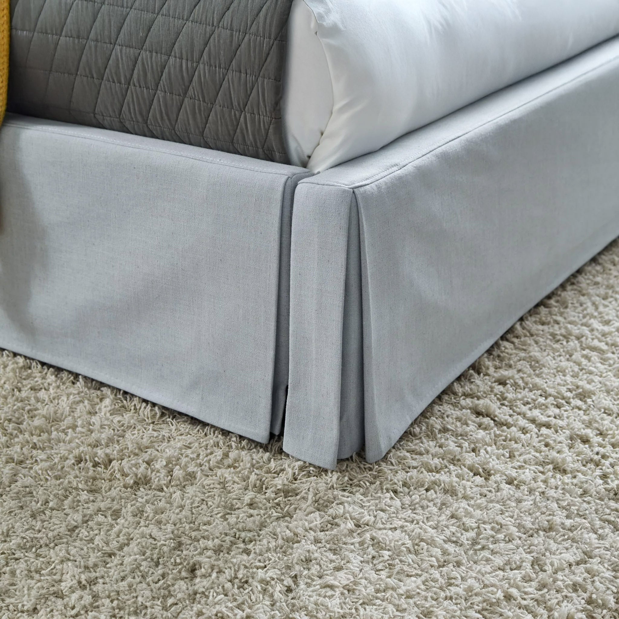 Skirted panel bed