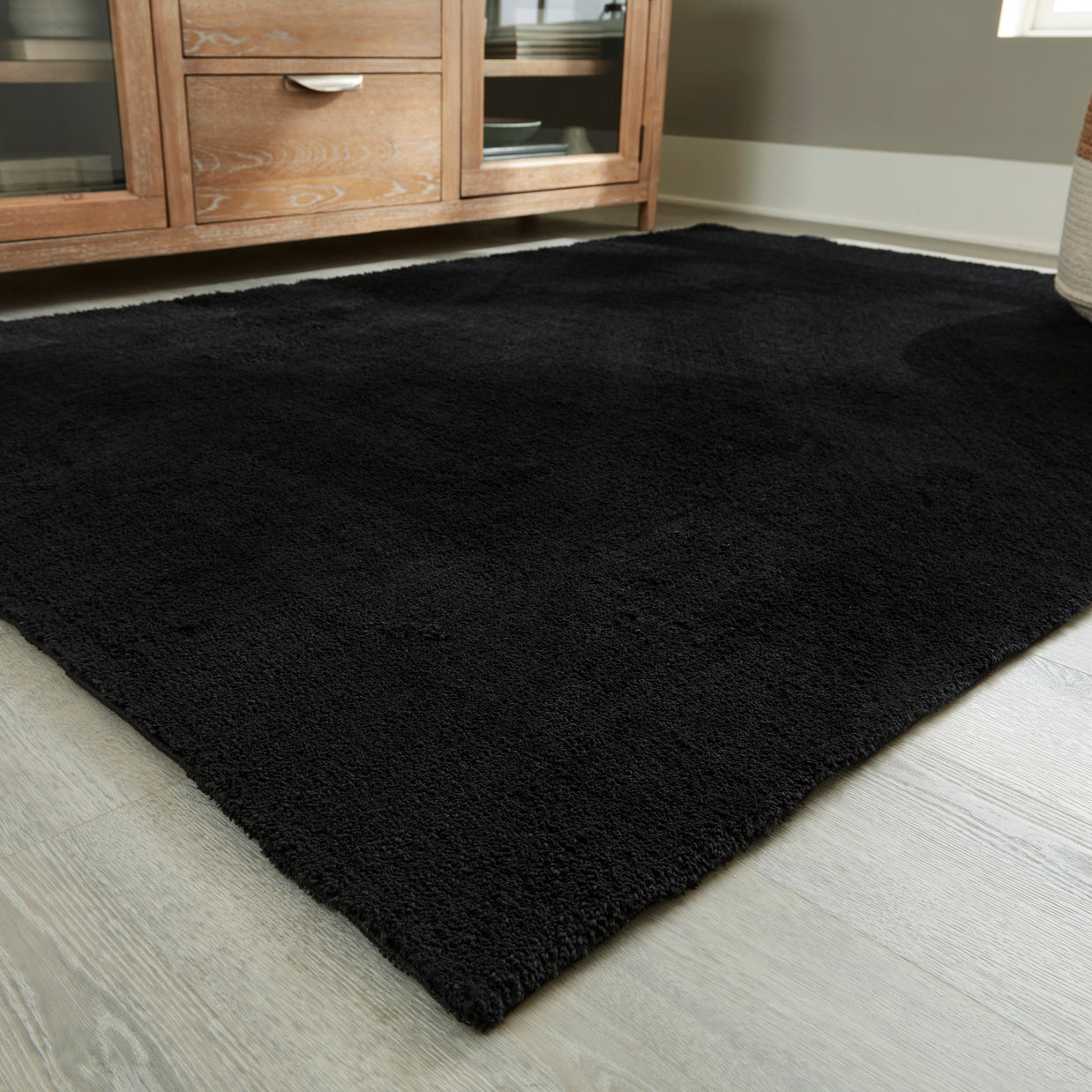 Subtle Textured Solid Black Area Rug