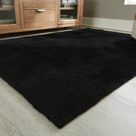 Subtle Textured Solid Black Area Rug