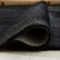 Subtle Textured Solid Black Area Rug