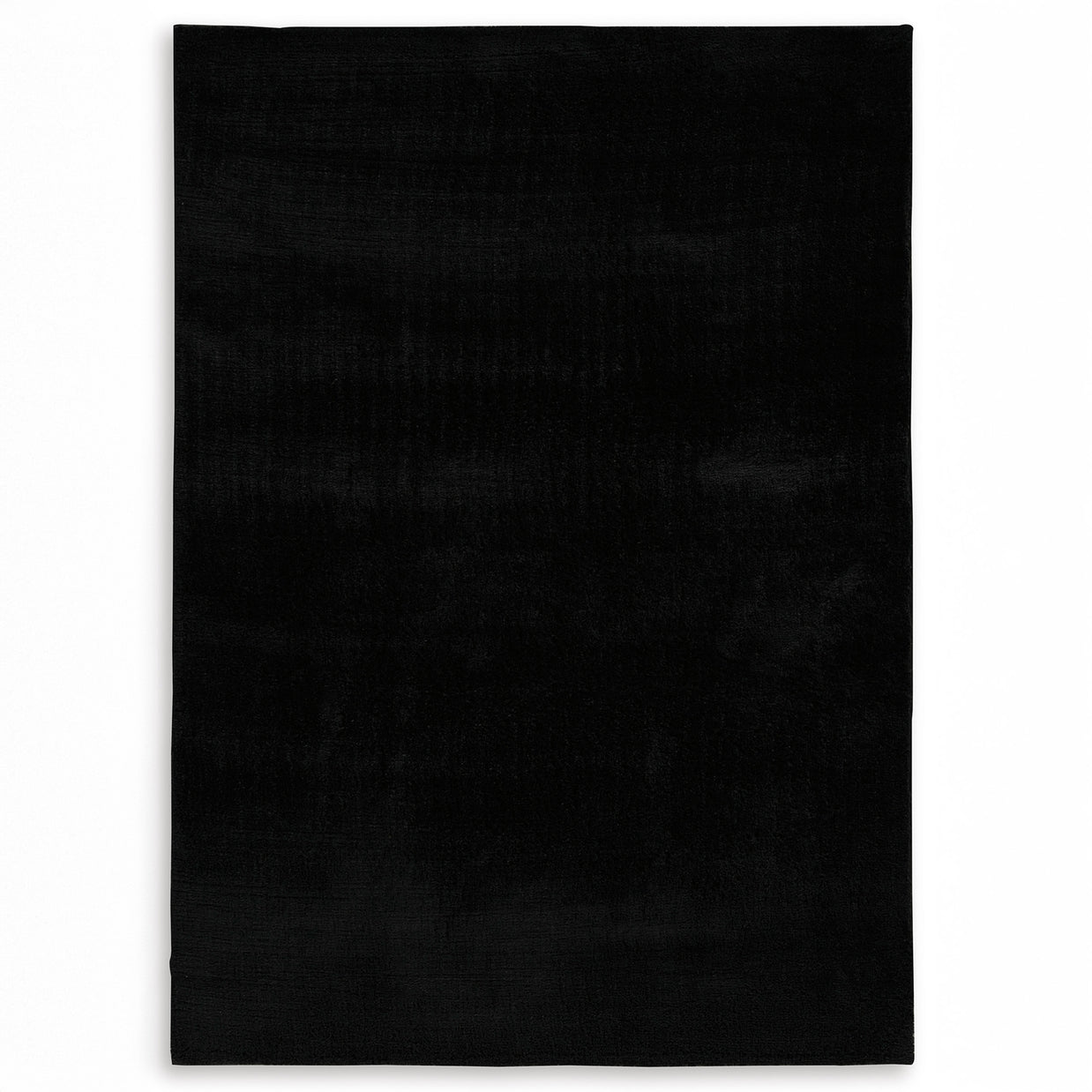 Subtle Textured Solid Black Area Rug
