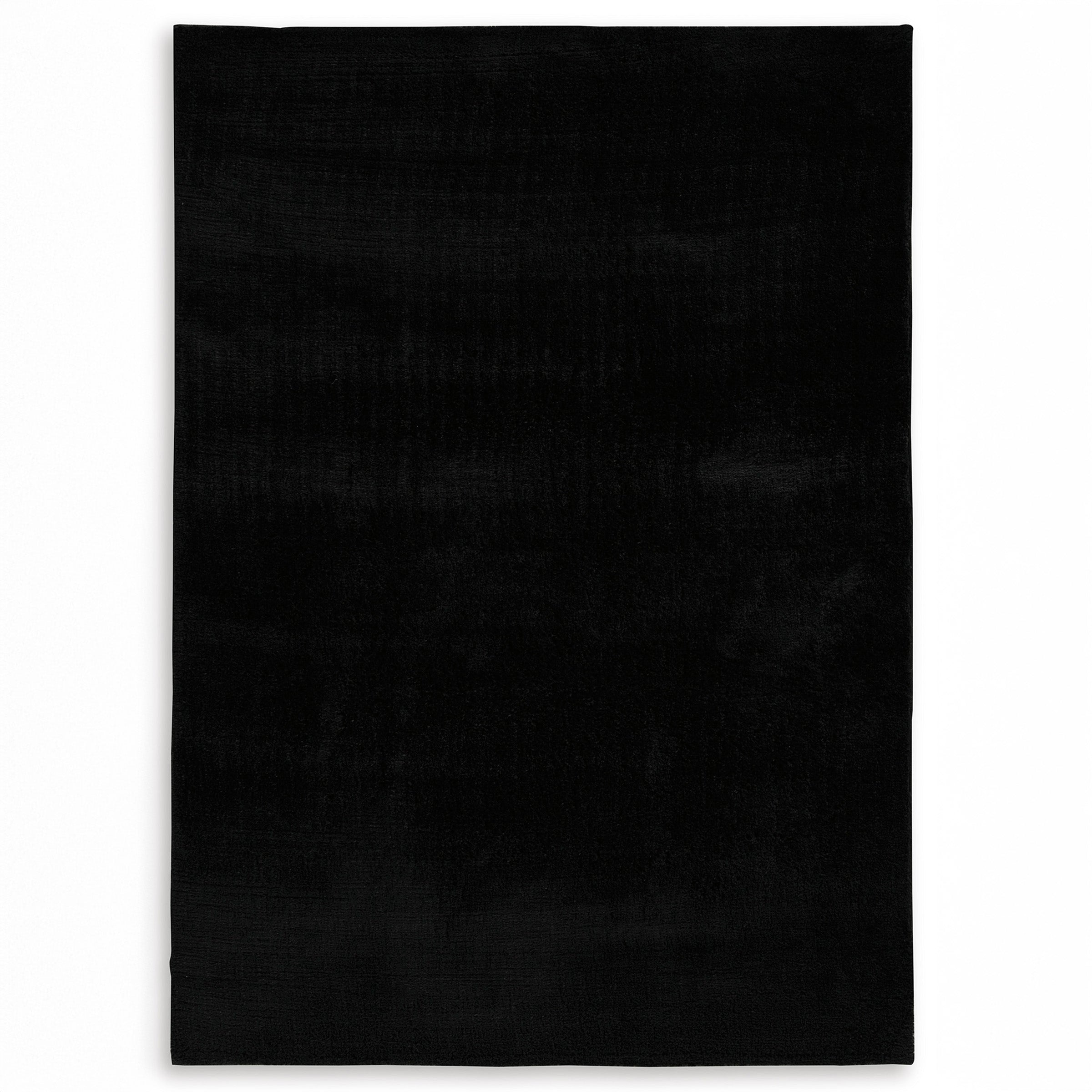 Subtle Textured Solid Black Area Rug