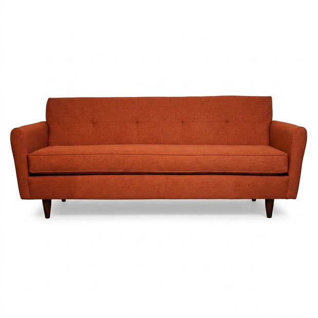 Orange sofa on a white background