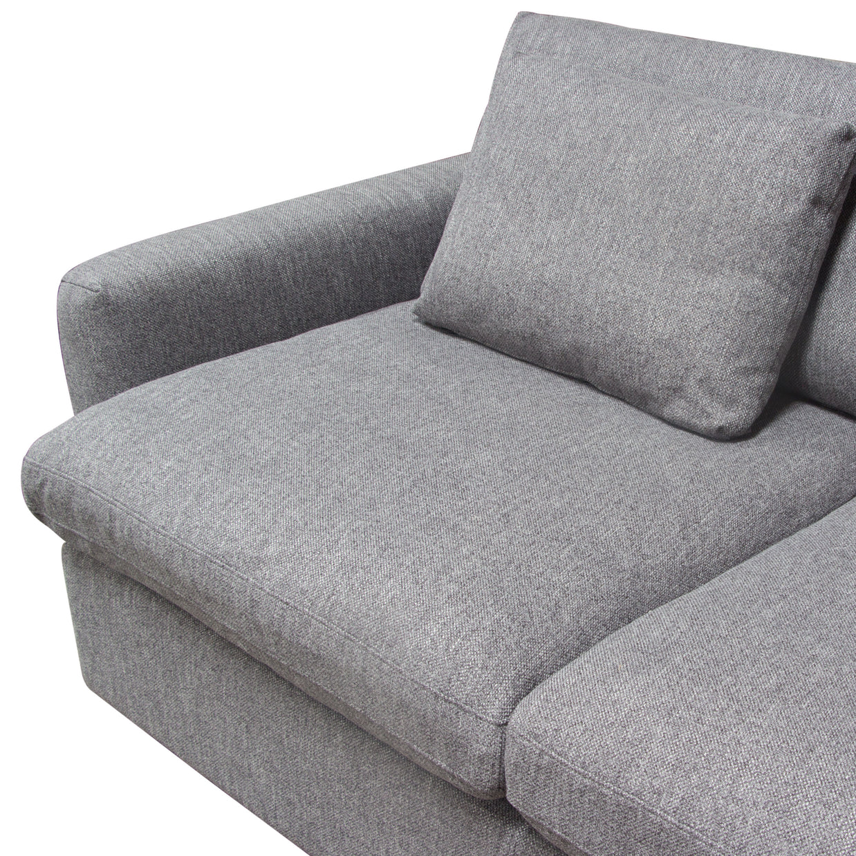 Feather-down cushion detail showing plush fill