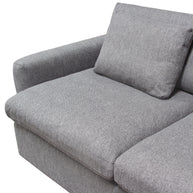 Feather-down cushion detail showing plush fill
