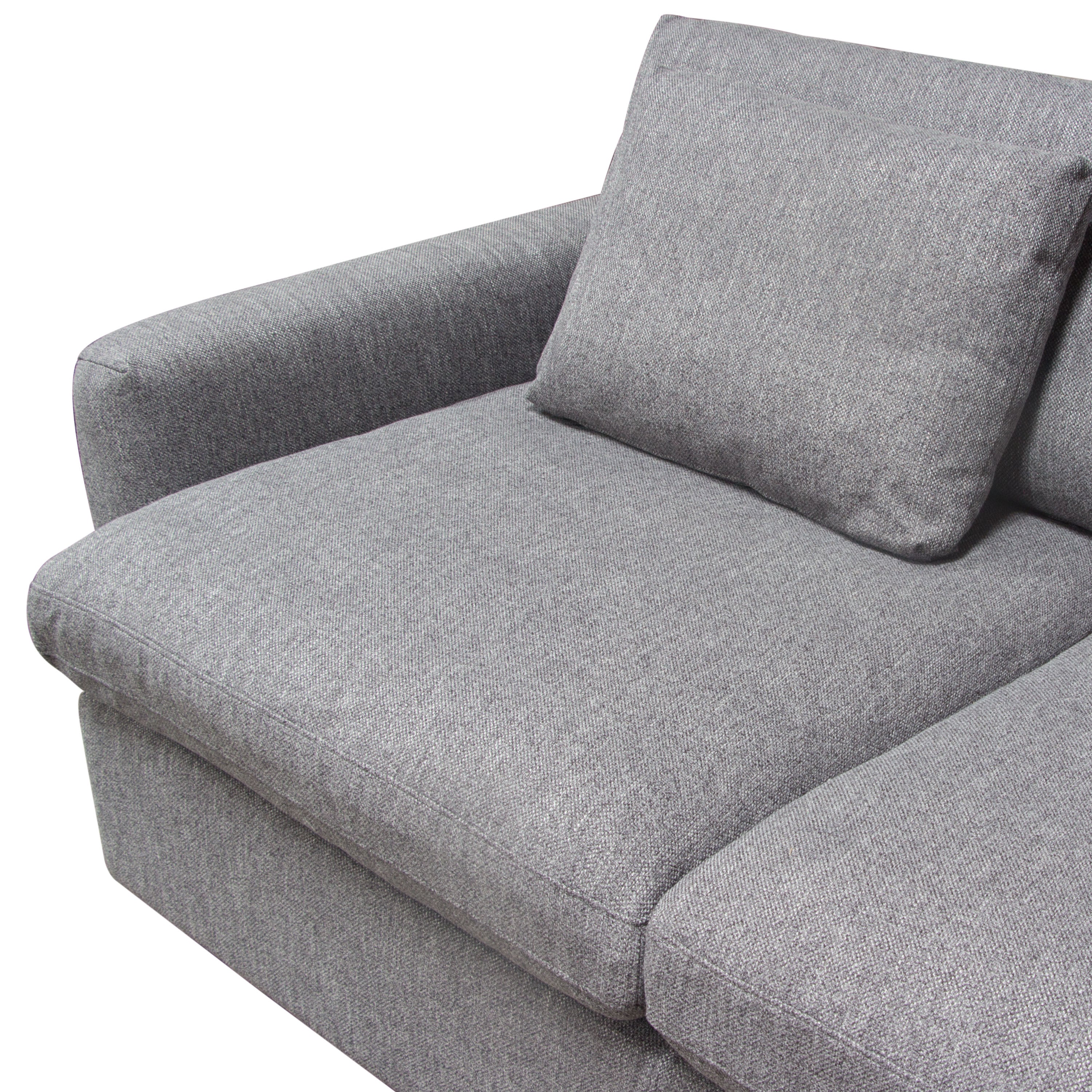 Feather-down cushion detail showing plush fill