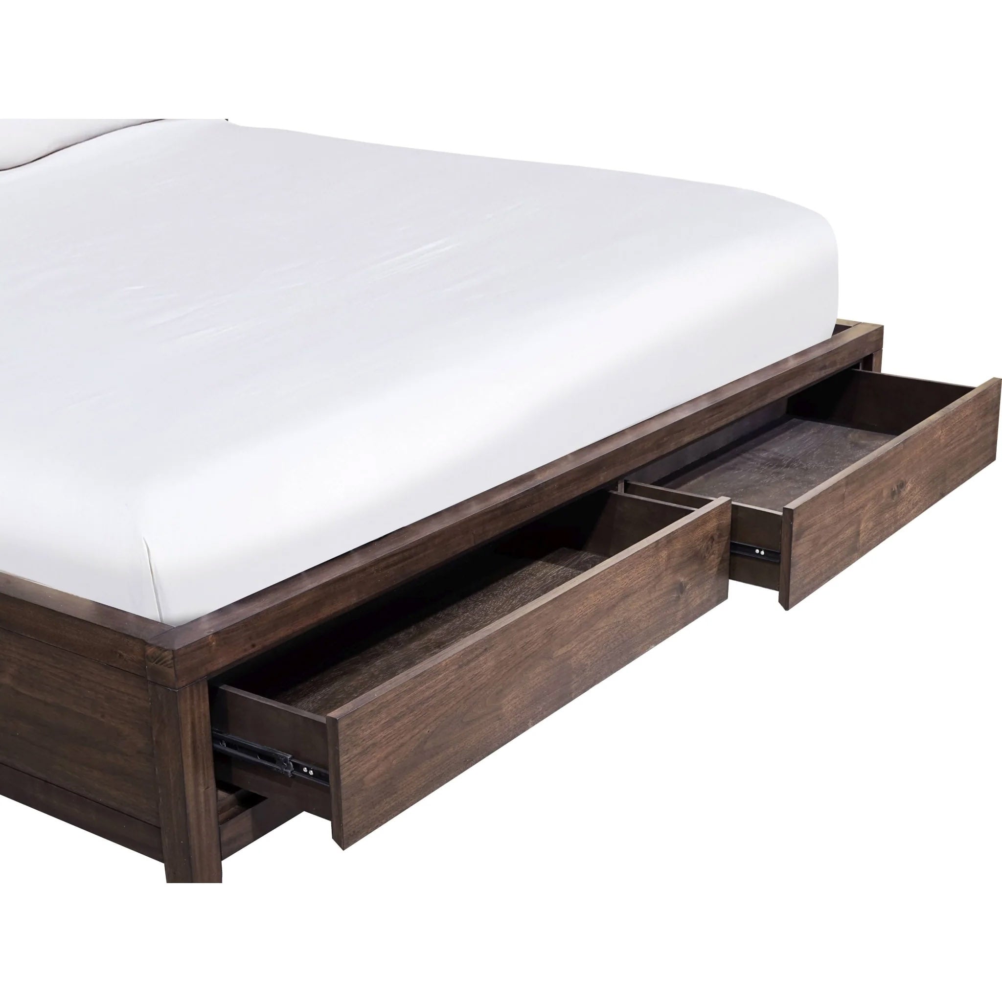 Hidden footboard storage drawers open on mahogany platform bed