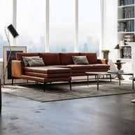 Tan leather sectional with left-facing chaise angled view