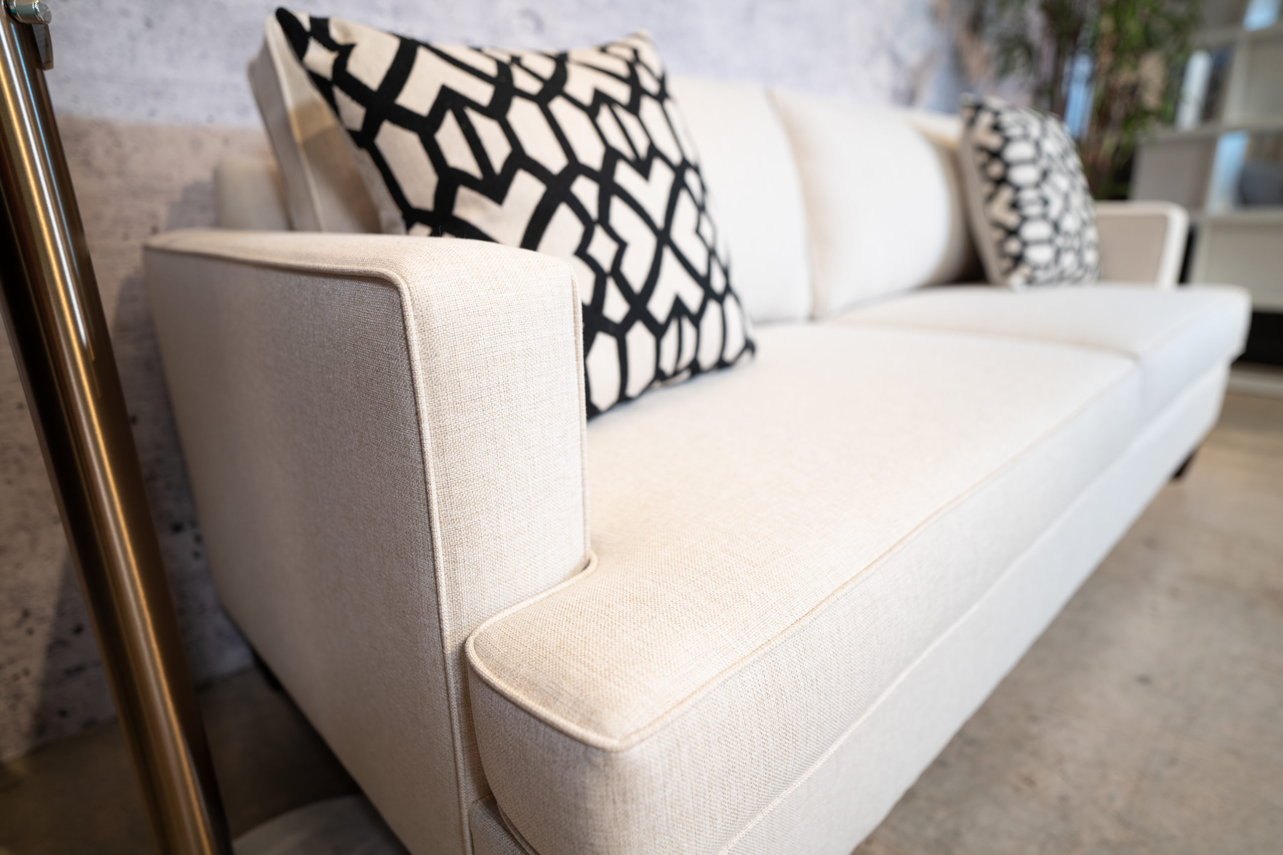 Custom white sofa with pillows